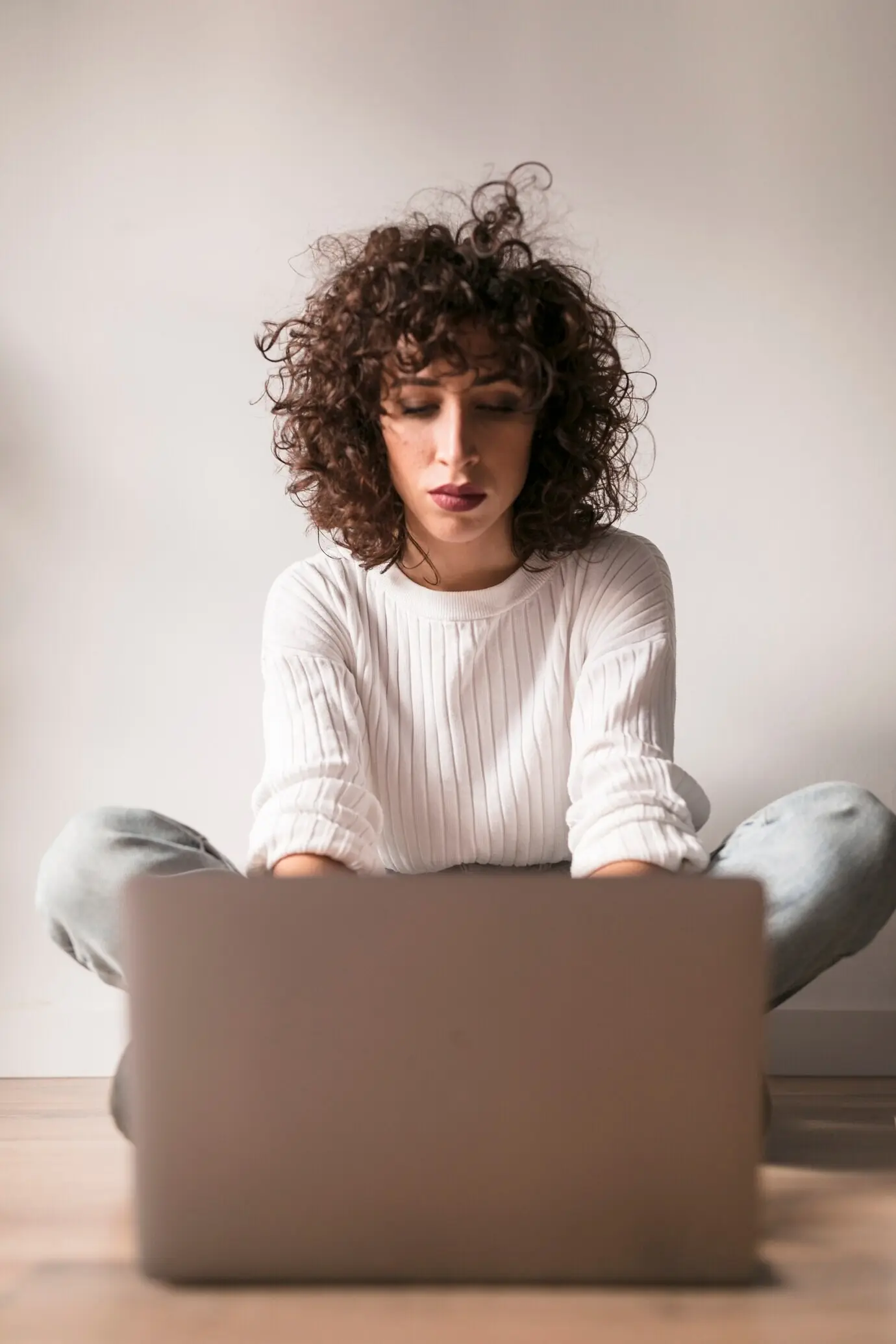 A girl with a laptop.